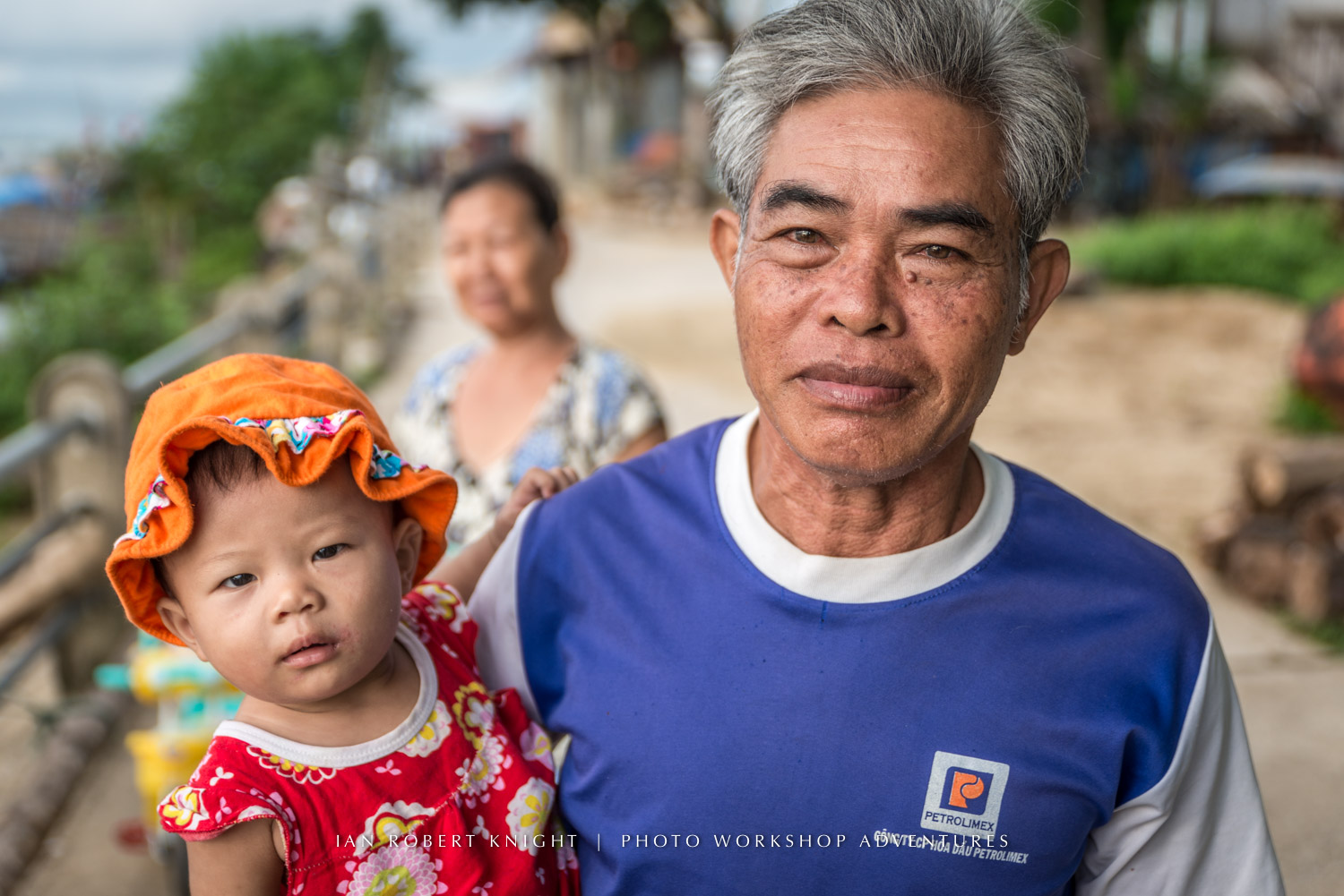 Grandfather with grandchild in Vietnam
