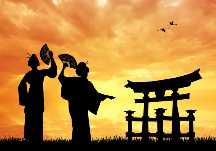 Geishas at sunset in Japan.