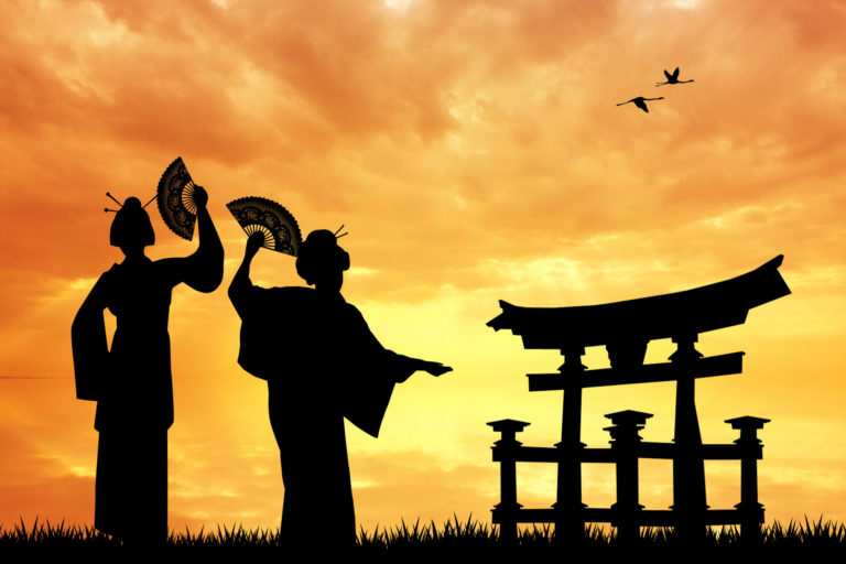 Geishas at sunset in Japan.