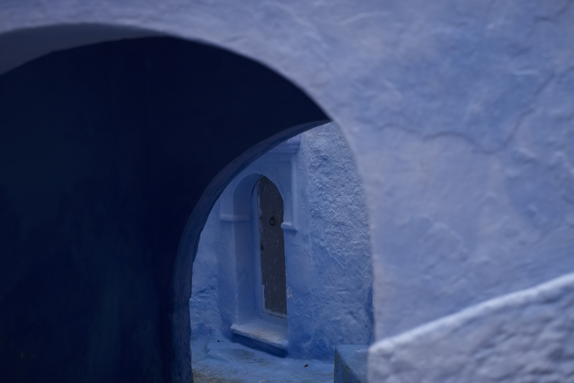 Photo of blue walls in Chefchaouen, Morocco, by Laurie Cohen.