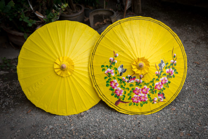 Photo of two yellow umbrellas, by Ian Robert Knight.