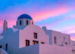 Photo of a pink sunset in Santorini, by Jane Jamison, on Think Orange Magazine.